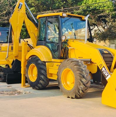 74.6kW JCB 4CX używany ładowarka Żółty 4378kg Podnoszenie używany ładowarka wyciągów Koło w ruchu